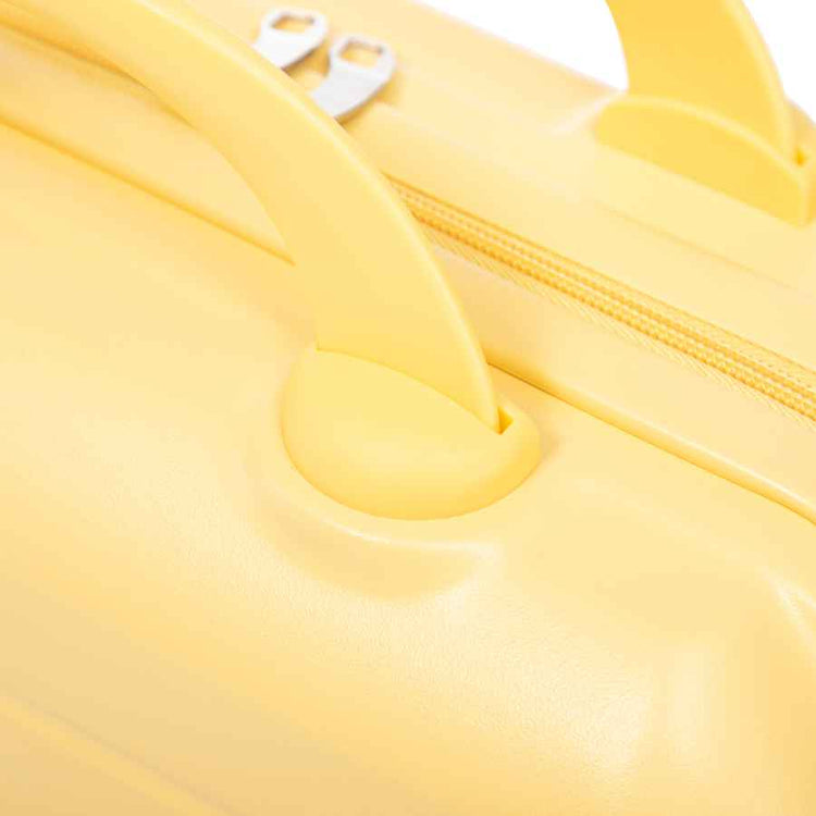Detailed shot of yellow ABS spinner luggage handle attachment with rounded base and secure fit for easy carrying.