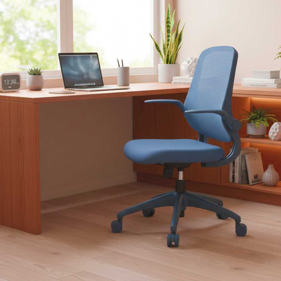 Blue office chair in front of a wooden desk with a laptop and decor items.