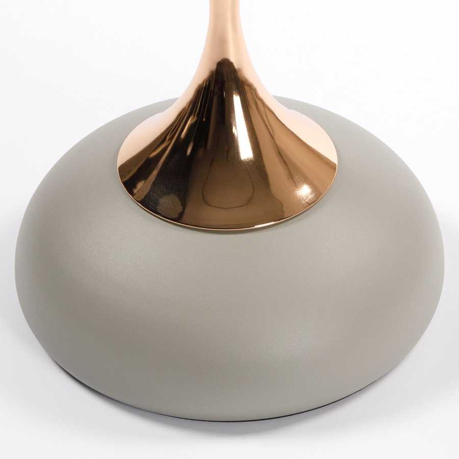 Base of the Mermaid Tail Coffee Table in matte grey with a glossy gold stem, combining modern aesthetics with sturdy design.