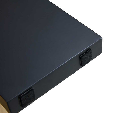 Close-up of MDF Coffee Table Modern - Minimalist Design with black tabletop and protective felt pads for scratch resistance.