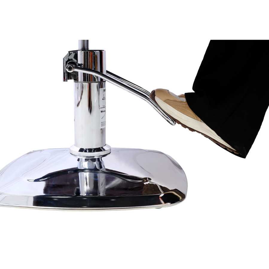 Close-up of foot pedal mechanism on chrome base of salon chair, allowing height adjustment for stylist convenience.
