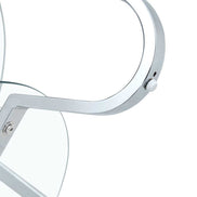 Close-up of chrome-finished vintage metal frame on 31.5'' glass coffee table, showcasing curved leg design and sturdy construction.