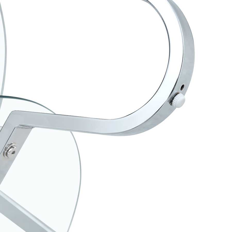 Close-up of chrome-finished vintage metal frame on 31.5'' glass coffee table, showcasing curved leg design and sturdy construction.