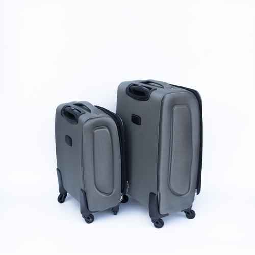 Two gray suitcases on a white background