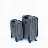Two gray suitcases on a white background