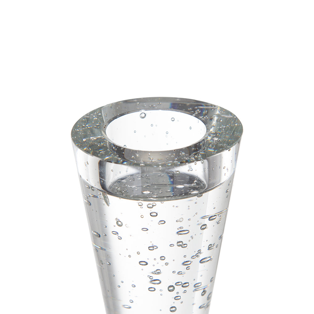 A clear glass vase with a wide circular rim and a tapered body, filled with tiny suspended bubbles, shown on a plain white background.