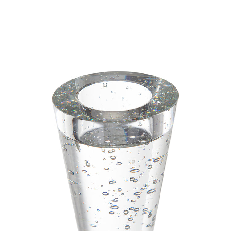 A clear glass vase with a wide circular rim and a tapered body, filled with tiny suspended bubbles, shown on a plain white background.
