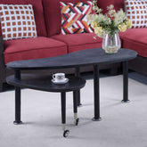 Accent 360 Rotatable Coffee Table with floral decor and teacup, showcasing elegant design and practical rolling lower tier.