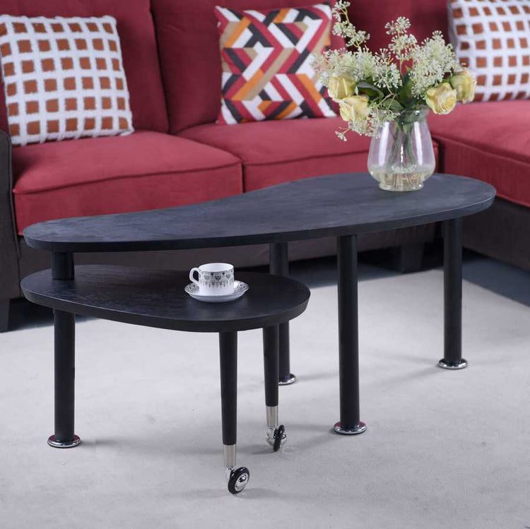 Accent 360 Rotatable Coffee Table with floral decor and teacup, showcasing elegant design and practical rolling lower tier.