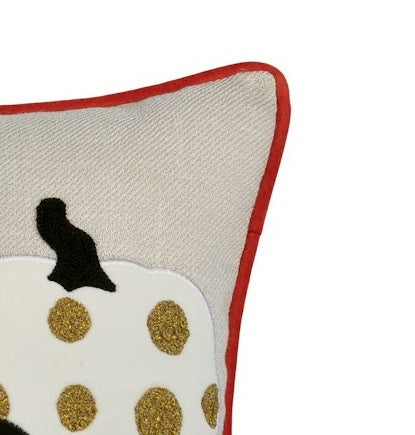 Decorative pillow with a pumpkin design on a white background