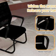 Black office chair with armrest widening feature in a room setting.