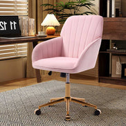 Pink office chair in a home office setting with a desk and decor.