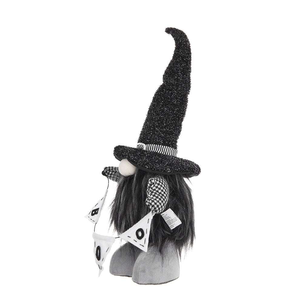 Halloween-themed gnome with a black hat on a white background