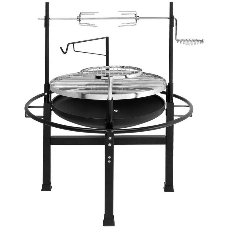Black metal grill with circular cooking area and vertical roasting rack on a white background