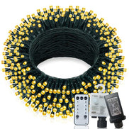 Coiled string light set with remote control and power adapter on a white background