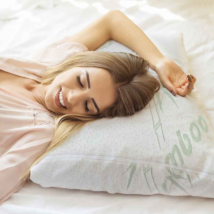 Woman resting on bamboo memory foam pillow