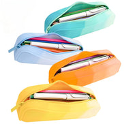 Set of four colorful pencil cases with pens inside on a white background