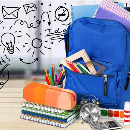 Blue backpack with school supplies including notebooks, pens, and a clock on a wooden surface.
