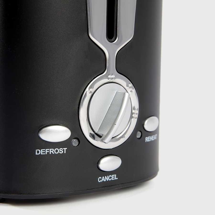 Close-up of 2 slice toaster control panel showing defrost, cancel, and reheat buttons for customizable toasting options.