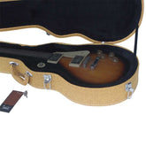 Guitar in a case with a visible brand tag on a white background