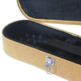 Open beige guitar case with a black interior on a white background