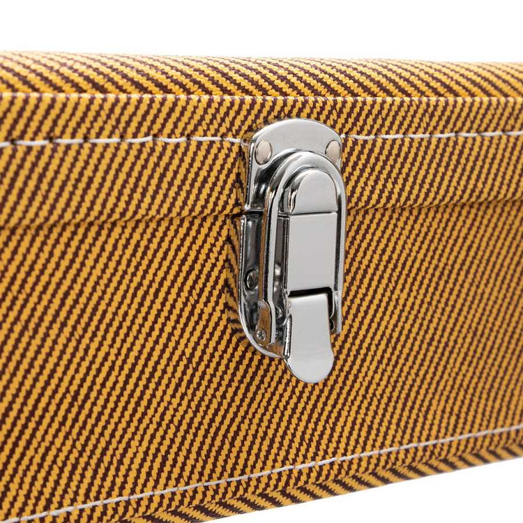 Close-up of a brown textured suitcase with a silver latch on a white background