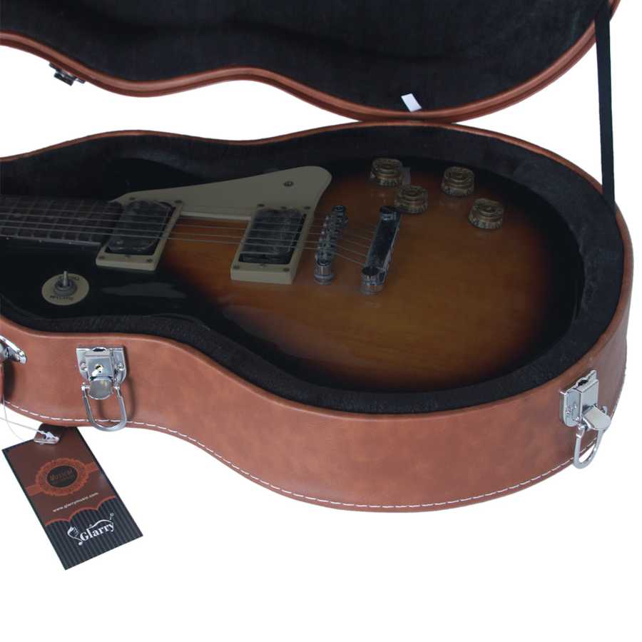 Electric guitar in an open brown case with a visible brand tag.