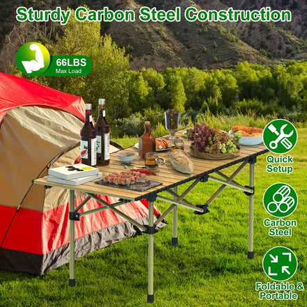 Camping table with food and drinks next to a tent in a scenic outdoor setting