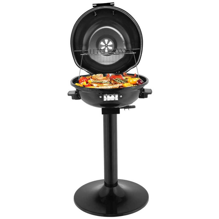 Black portable grill with food on a white background