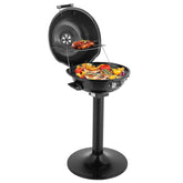 Portable grill with food on a white background