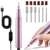 Pink electric nail drill with attachments and USB cable on a white background