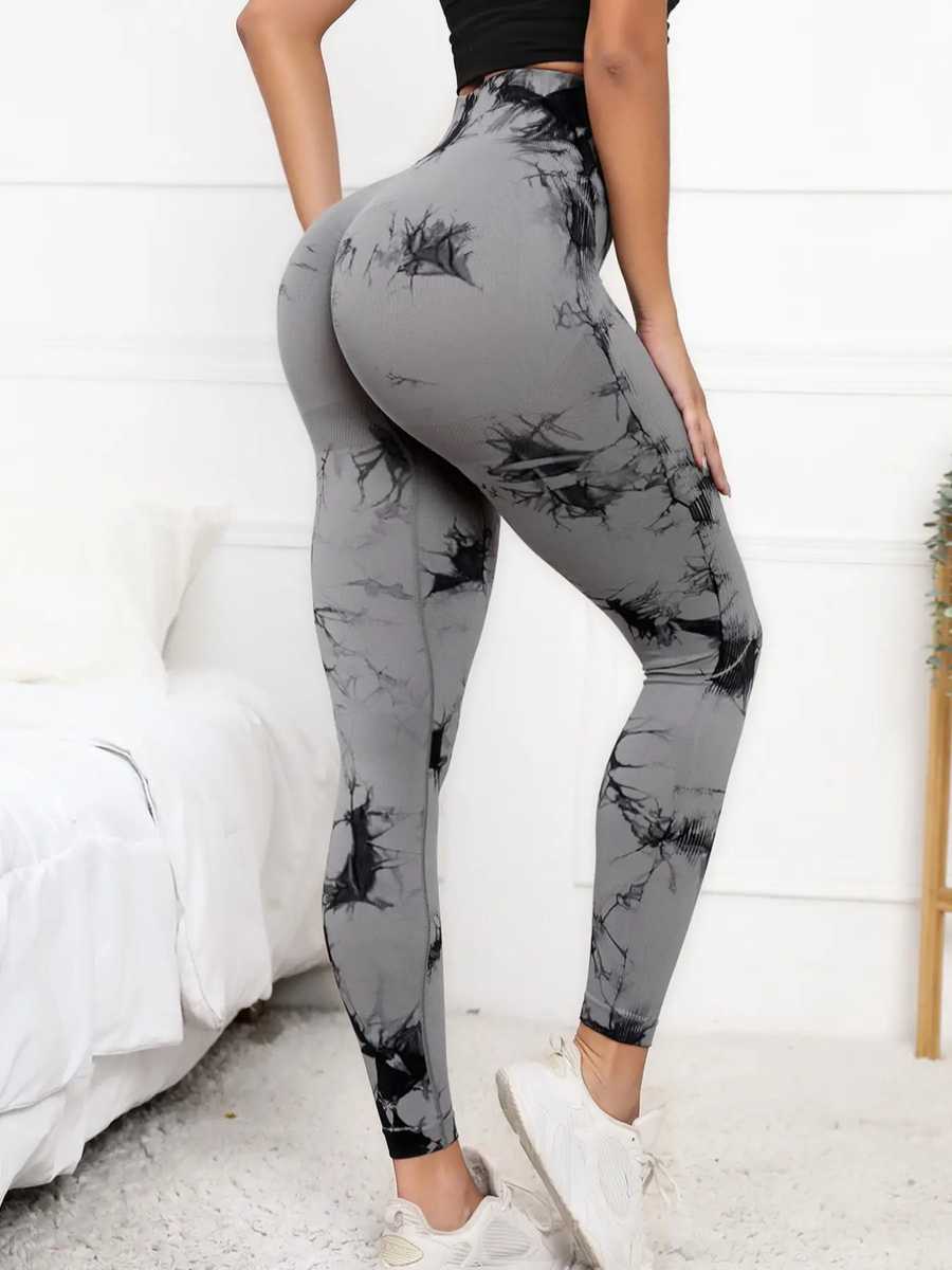 Scrunch leggings women in gray tie-dye with high waist and compression fit for tummy control and butt lift. Ideal for yoga and gym workouts.