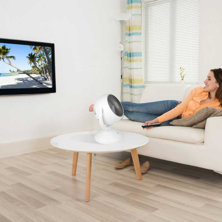Portable desk fan in living room setting