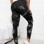 Black scrunch leggings for women with high waist and compression fit, designed for tummy control and gym-ready performance.