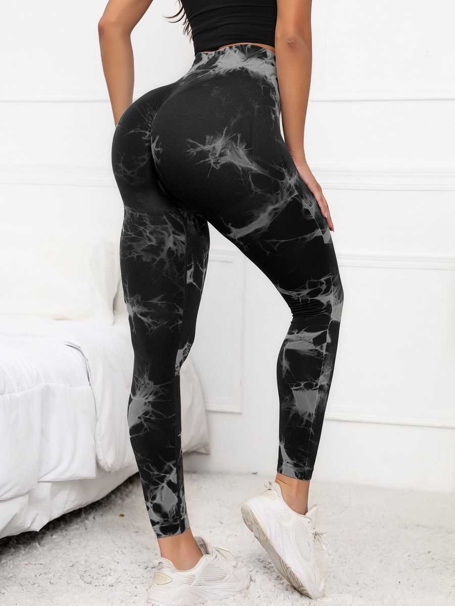 Scrunch leggings women high waist in black marble print with compression fit for tummy control and butt lift, ideal for yoga and gym workouts.