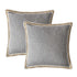 Two gray pillows with decorative trim on a white background
