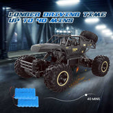 Remote control monster truck with battery pack on a dark background
