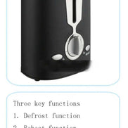 Black 2 slice toaster with three key functions: defrost, reheat, and one-click cancel for safe and efficient toasting every time.