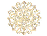 Decorative gold mandala design on a white background