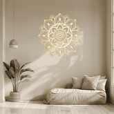 Decorative mandala wall art in a living room setting with a plant and sofa.