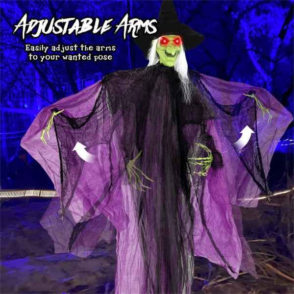 Adjustable witch Halloween decoration with a green face, white hair, black hat and robe, and purple translucent webbed arms, shown with text and arrows explaining arm adjustment.