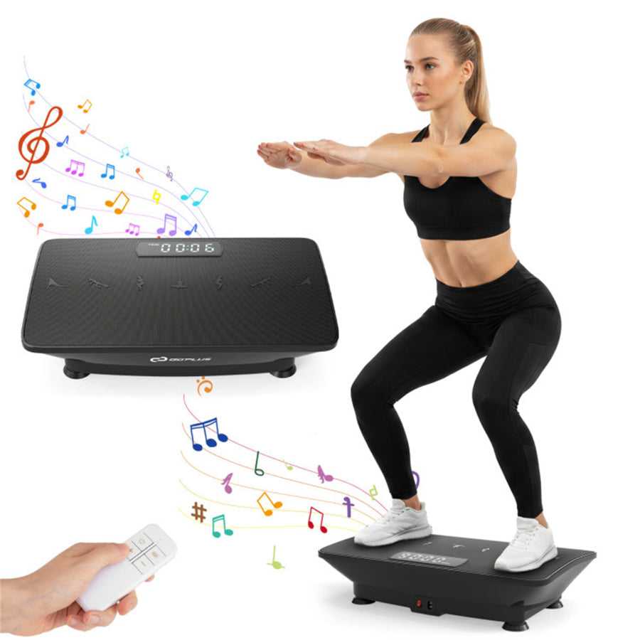 Black full body vibration exercise machine with remote and colorful musical notes