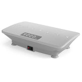 Close-up of gray vibration plate with digital display and control buttons