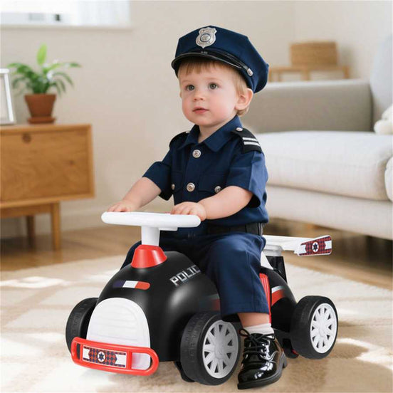 Toddler dressed as a police officer riding the Kids Ride-On Car for Toddlers, promoting imaginative play and motor skill development.