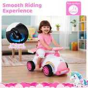 Toddler enjoying smooth ride on Kids Ride-On Car Toy with universal front wheels, designed for easy foot-to-floor movement indoors.