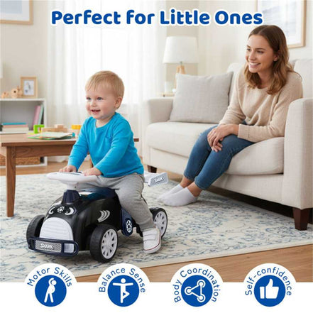 Kids Ride-On Car with Music - Toddler riding shark-themed toy indoors, promoting motor skills, balance, and self-confidence development.