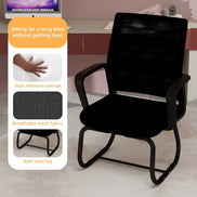 Black office chair with ergonomic features highlighted on a blurred office background