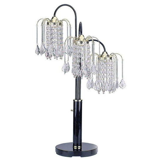 Decorative table lamp with crystal accents on a white background