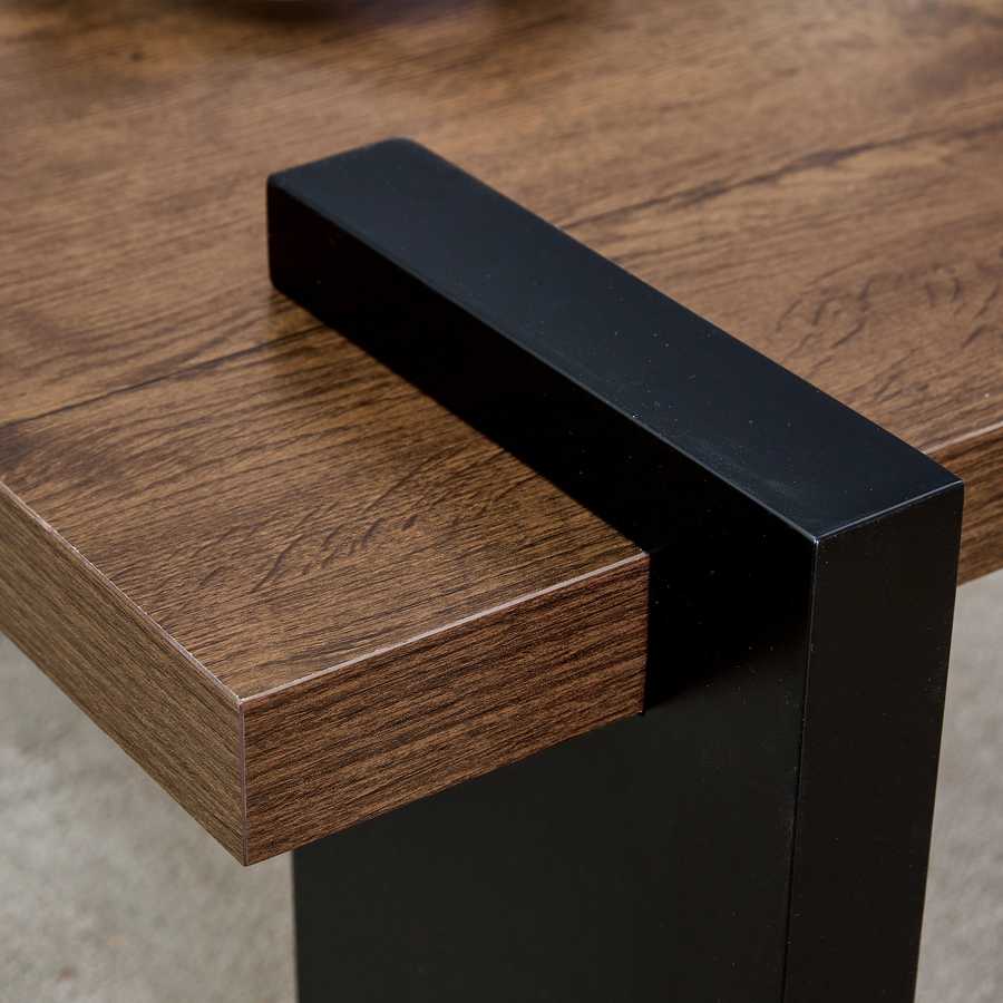 Detail of black leg joint on Modern Walnut Coffee Table - MDF Style, highlighting sturdy construction and clean lines.