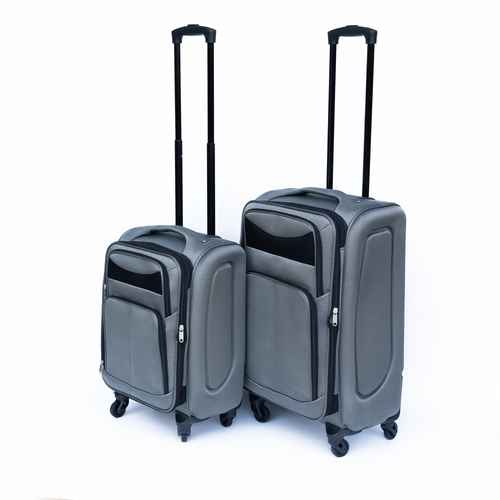 Set of three gray suitcases with wheels on a white background